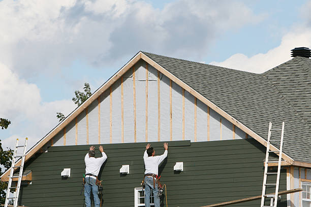 Professional Siding technician working in Nicktown, PA